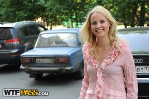 18 year old girl Katie Lewis stands naked after undressing in her bedroom